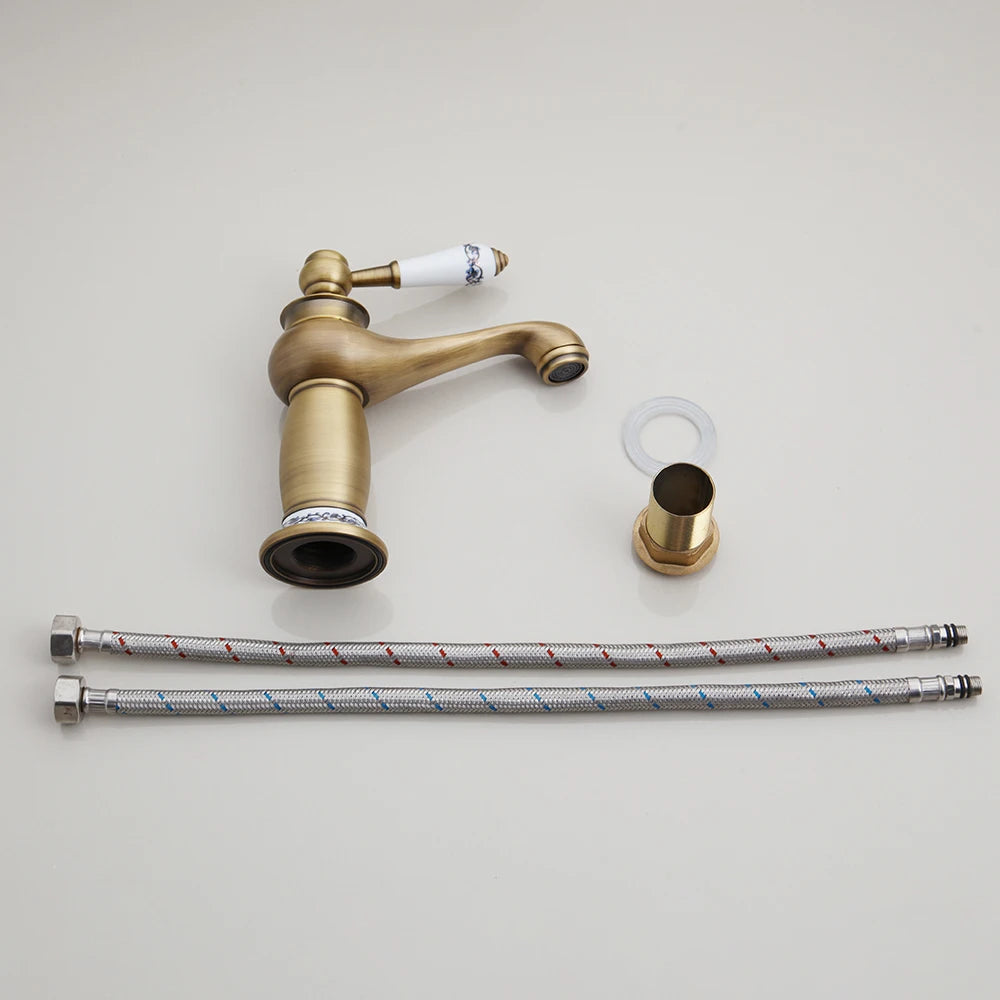 Robinet salle de bain dore antique , deux flexibles rouge et joint blanc et rondelle