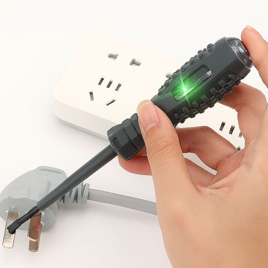 main teste prises electrique femelle grise avec Tournevis stylo électrique avec voyant vert