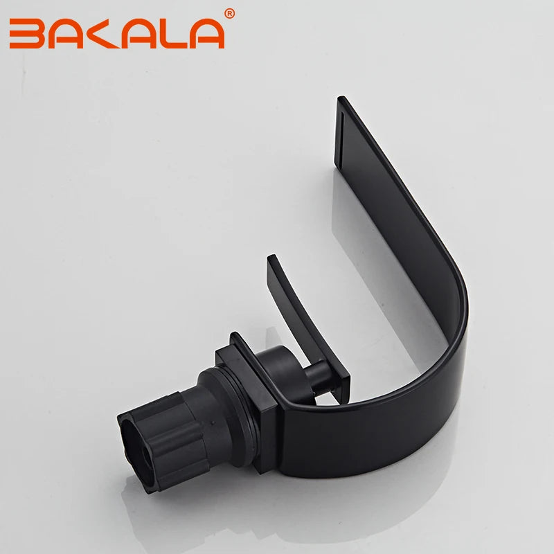 robinet salle de bain noir sur table