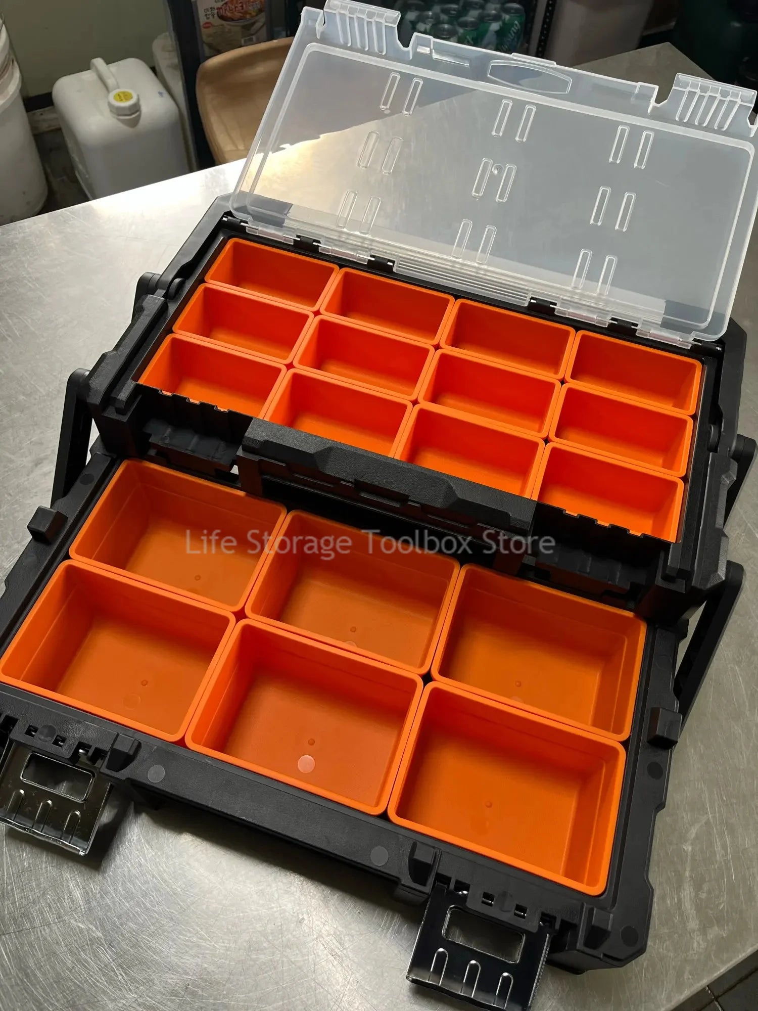  Caisse a outils a deux couches noir-orange ouverte