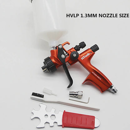 Pistolet peinture orange , godet blanc ,gachette noire, buse noire, cle et brosse