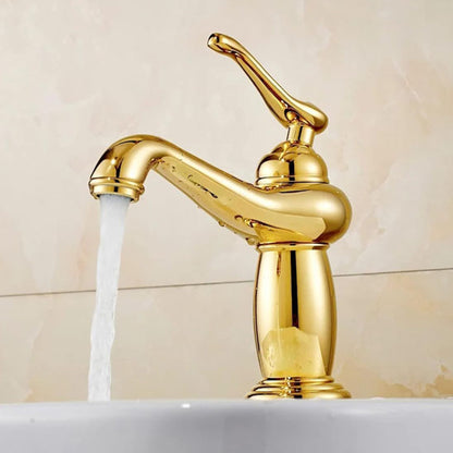 Robinet salle de bain dore antique eau coule lavabo blanc
