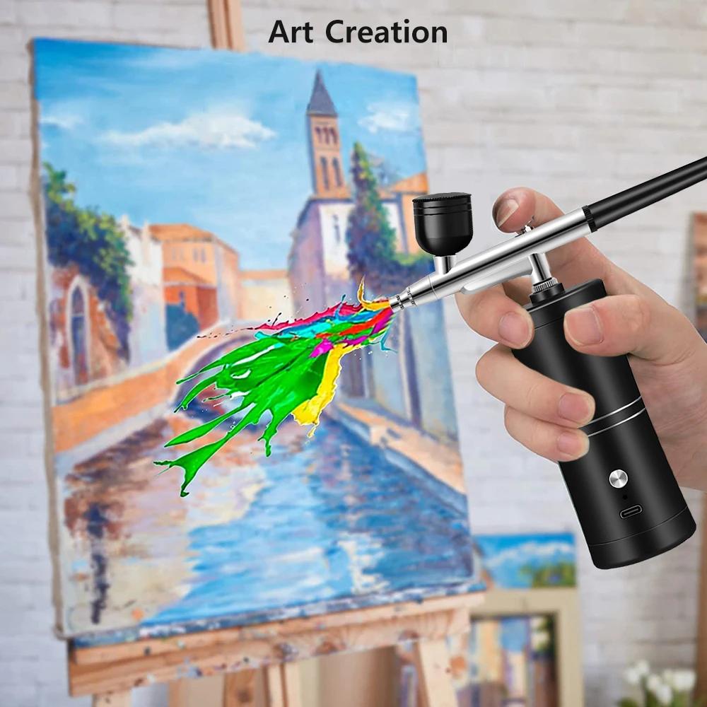 application du Pistolet peinture noir , creation peinture art