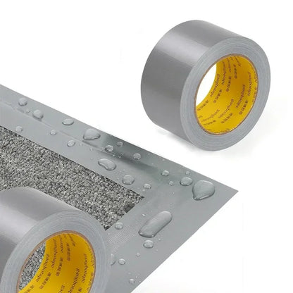 deux rouleaux Ruban adhesif gris , rouleau ruban adhesif gris colle tapis