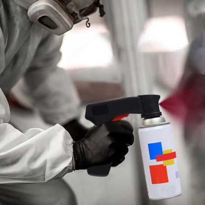 homme masque et gants noires tient Pistolet peinture noir a gachette rouge , jet peinture rouge et bombonne blanche