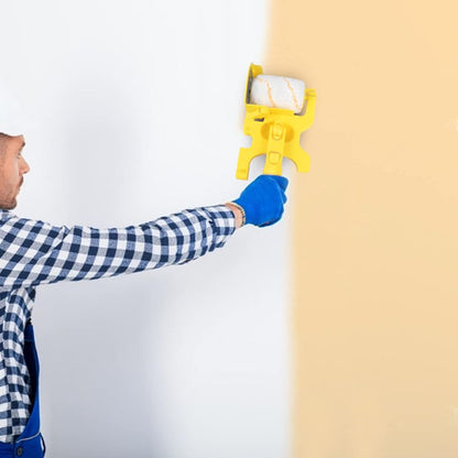 homme-peint-mur-blanc-en-jaune-avec-Rouleau-peinture-jaune