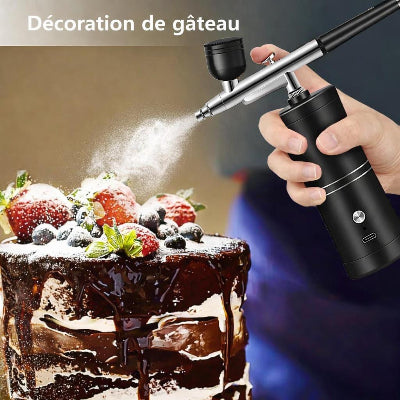 main decore avec Pistolet peinture noir , jet peinture blanc