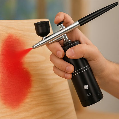 main peint avec Pistolet peinture noir , planche bois en rouge