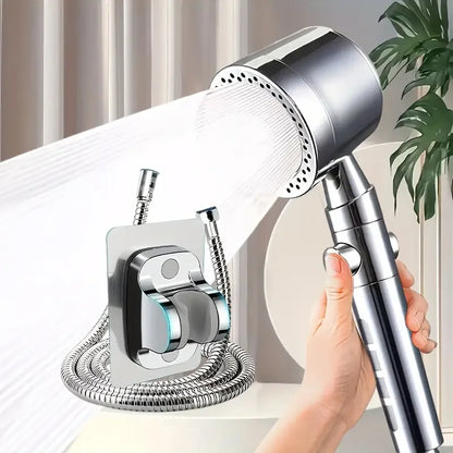 main tient Pommeau de douche filtrant gris  surpport gris avec flexible jet eau pulveristeur