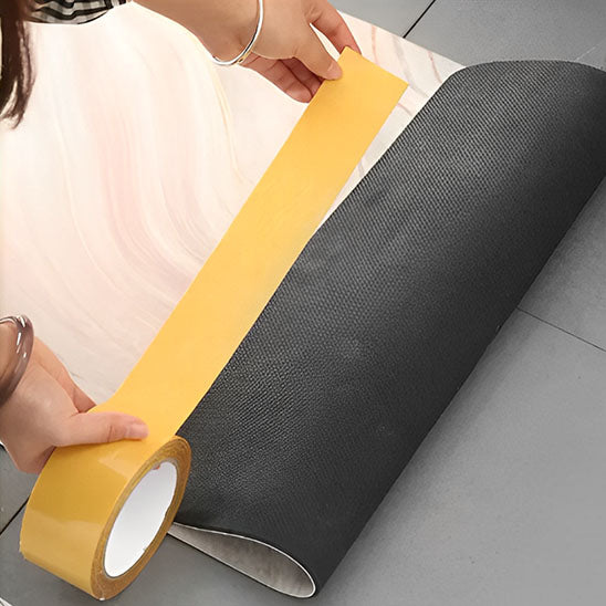 mains tirent protection du rouleau de Ruban adhesif transparent double faces tapis sol
