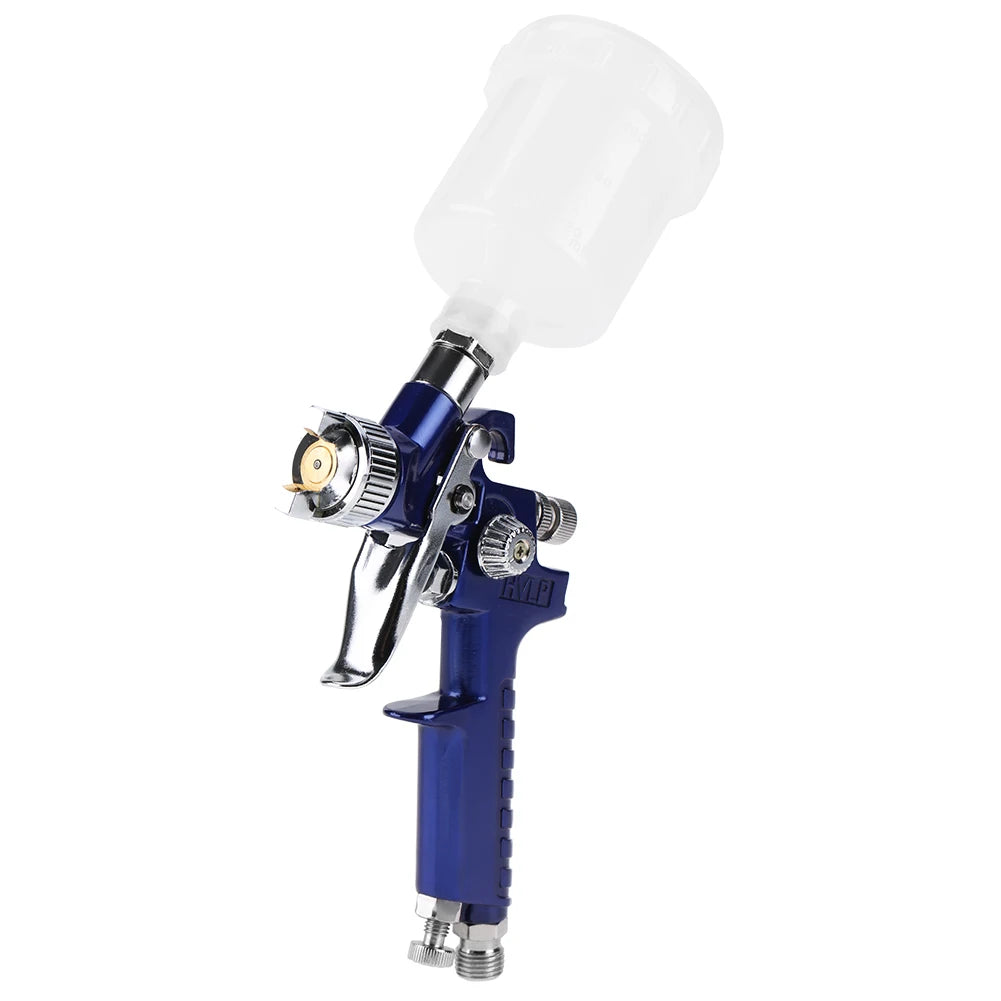 pistolet peinture bleu avec réservoir blanc et buse