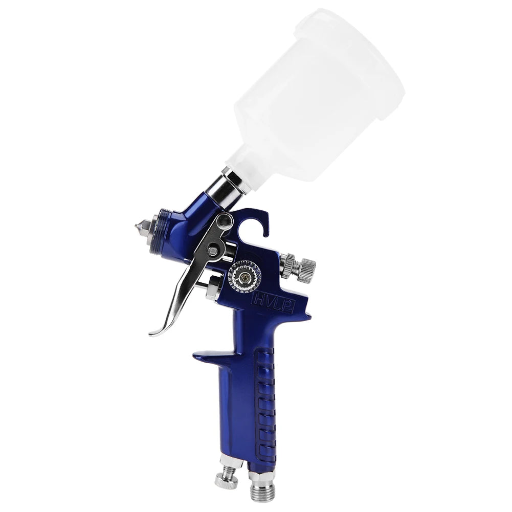 pistolet peinture bleu avec réservoir blanc et buse