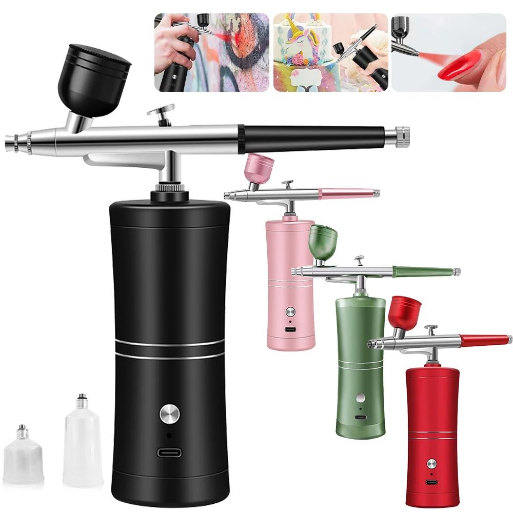 quatre Pistolet peinture noir , rose , vert rouge, ongle, gateau