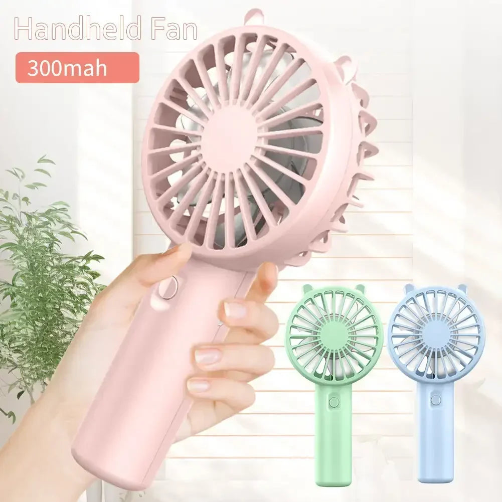 Trois Mini ventilateur portable vert, bleu rose, 300mAh