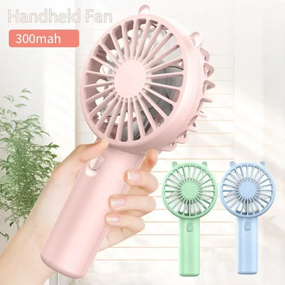 Trois Mini ventilateur portable vert, bleu rose, 300mAh
