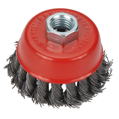 une Brosse metallique rouge pour perceuse